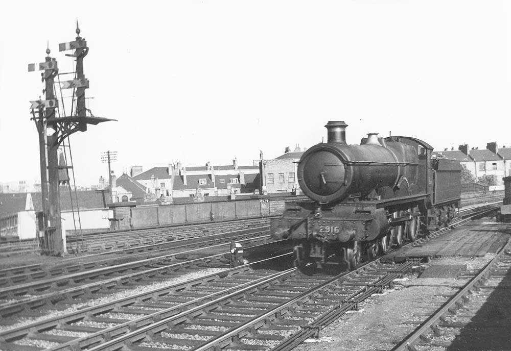 GWR 4-6-0 No 2916 'Saint Benedict' runs light engine through Leamington station in September 1935. 1935