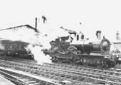 GWR 4-4-0 No 3267 Cornishman on an up express with a siphon behind the tender