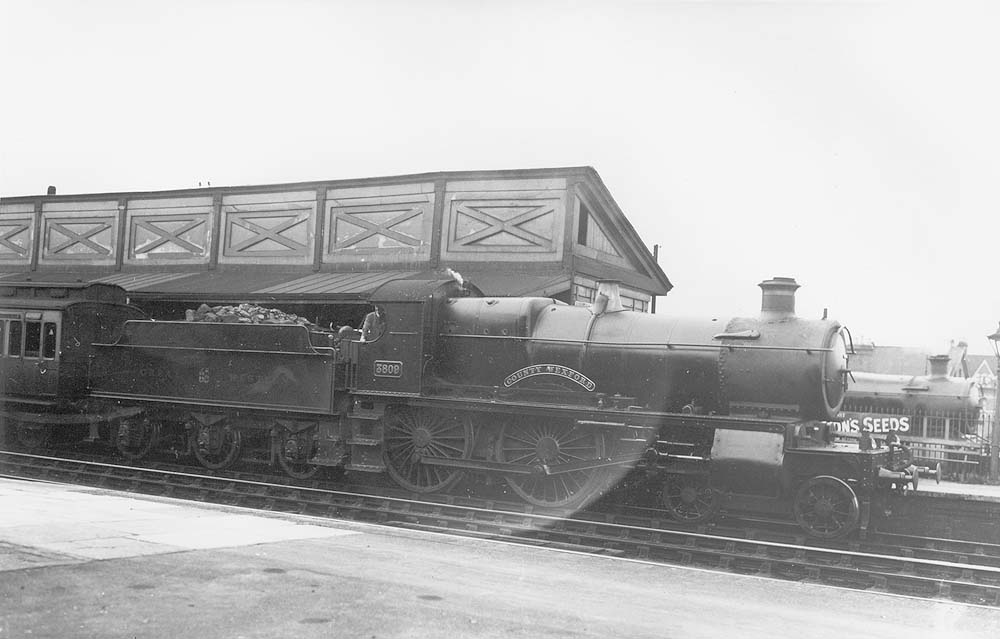 GWR 4-4-0 No 3809 County of Wexford on an up local passenger train made up of				clerestory coaching stock