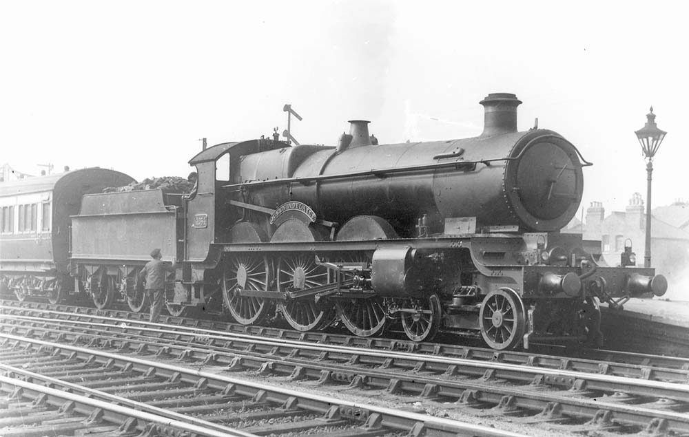 GWR 4-6-0 No 4034 'Queen Adelaide' stands at the head of an up express circa 1928-32