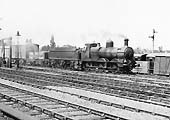 GWR 0-6-0 'Dean goods' No 2465 on an up freight about to pass around the rear of the station via the goods loop