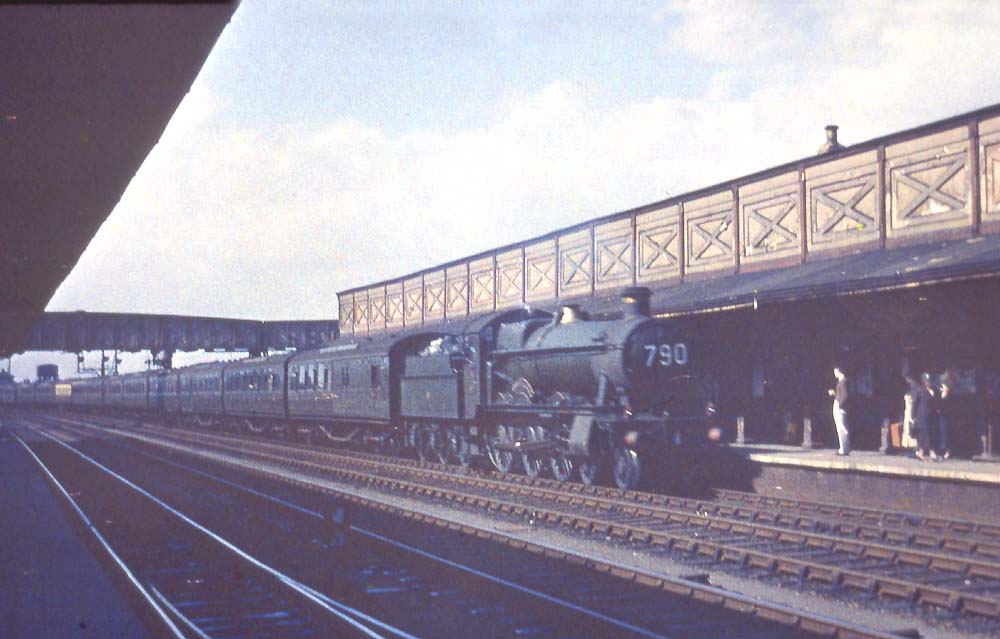An unidentified GWR 4-6-0 'Hall' at the head of an up express with predominantly SR coaching stock