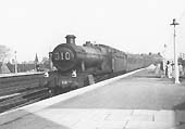 GWR 4-6-0 No 6878 'Longford Grange' coasts into the down platform with an express in October 1947