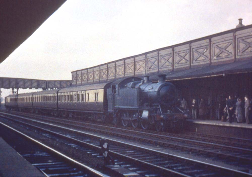  A GWR 51XX class 2-6-2T Prairie enters the station on an up local prior to the rebuilding of the station C1930s