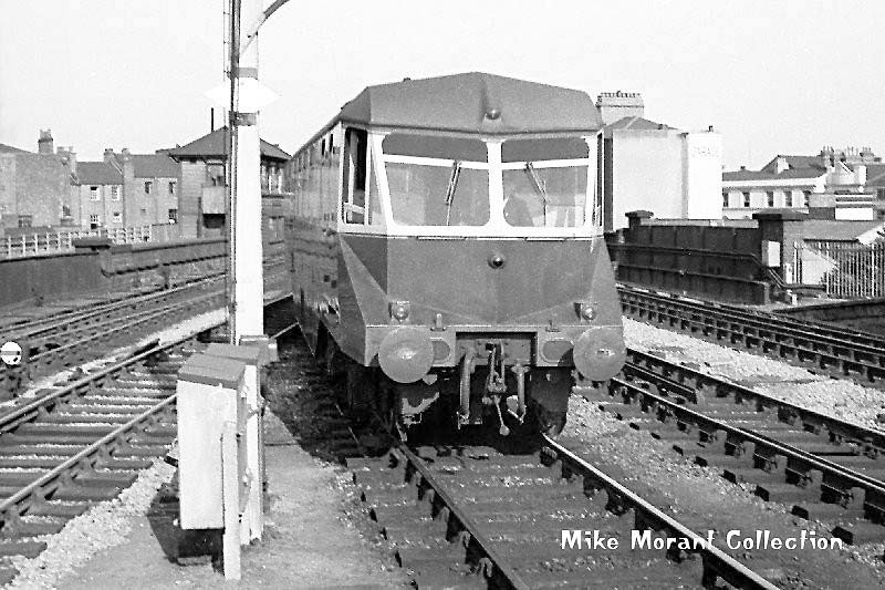 An unidentified ex-GWR Railcar is seen arriving wrong road at Leamington's up platform circa late 1950s