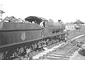 Ex-GWR 2-8-0 28xx Class No 2899 is seen approaching Leamington South Signal Box whilst at the head of an up goods train