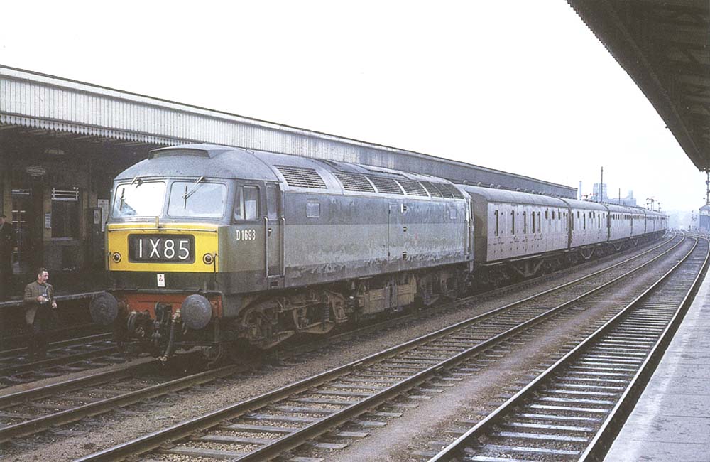 British Railways Type 4 D1698 is seen 'wrong road' on the up fast line being used on a driver training special on 24th March 1964