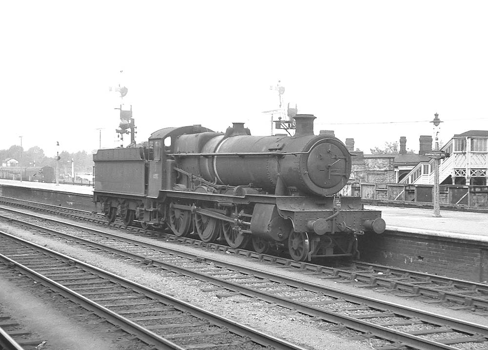 Ex-GWR Grange Class 4-6-0 No 6855 'Saighton Grange' pauses at Leamington's up platform on 19th July 1965