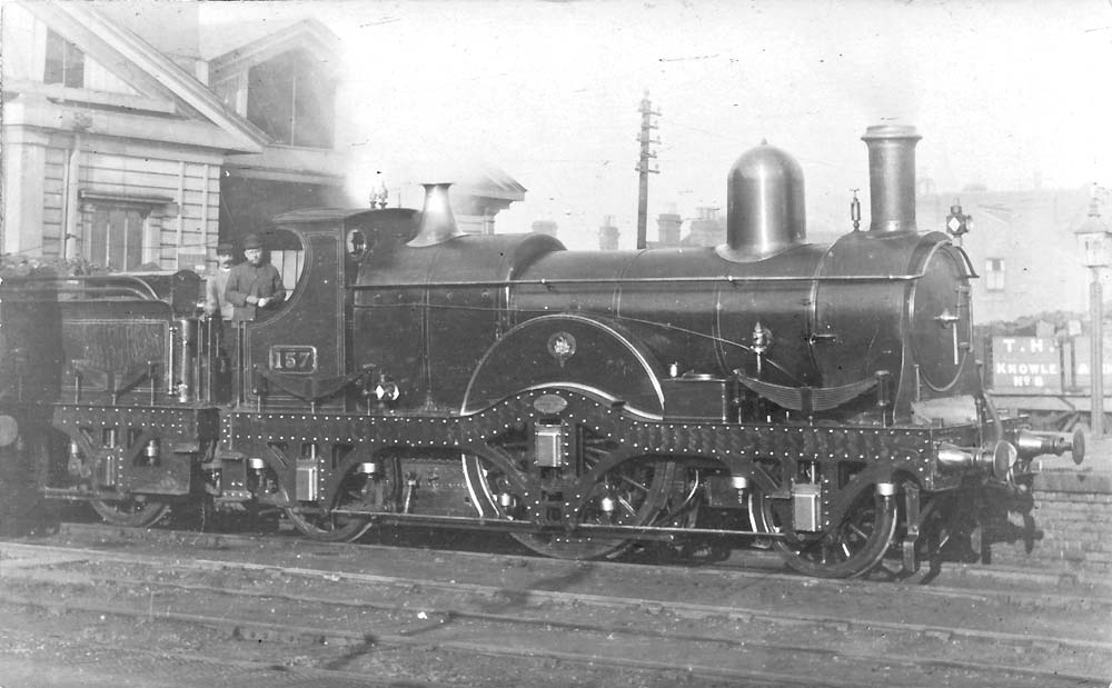 GWR 157 Class 2-2-2 No 157 is seen ready to depart from Leamington station's up platform whilst at the head of an express to Paddington