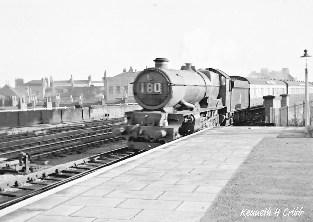 An unidentified ex-GWR King Class locomotive is seen arriving at Leamington station on 1st December 1951