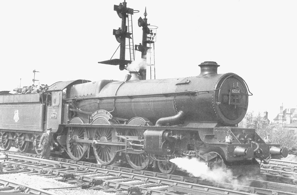 Ex-GWR 60xx Class 4-6-0 No 6004 'King George III' heads a Wolverhampton to Paddington service circa 1952