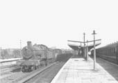 Ex-GWR 49xx Class 4-6-0 No 4943 'Marrington Hall' passes through on the down centre road during the early 1950s