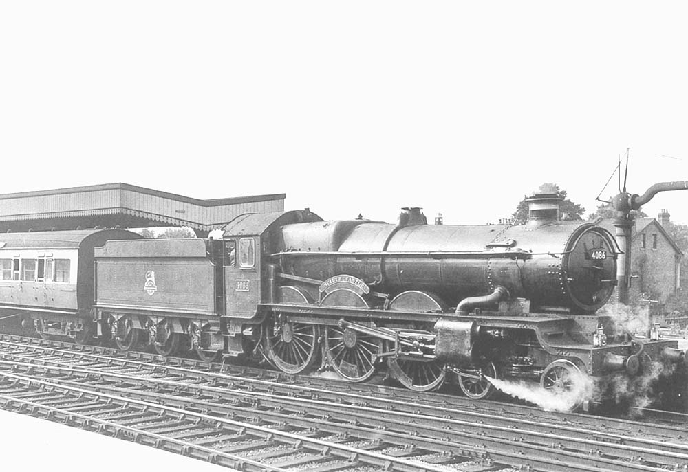 Ex-GWR Castle Class 4-6-0 No 4086 'Builth Castle' starts away from the up platform on 6th September 1952
