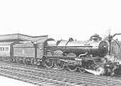 Ex-GWR Castle Class 4-6-0 No 4086 'Builth Castle' starts away from the up platform on 6th September 1952