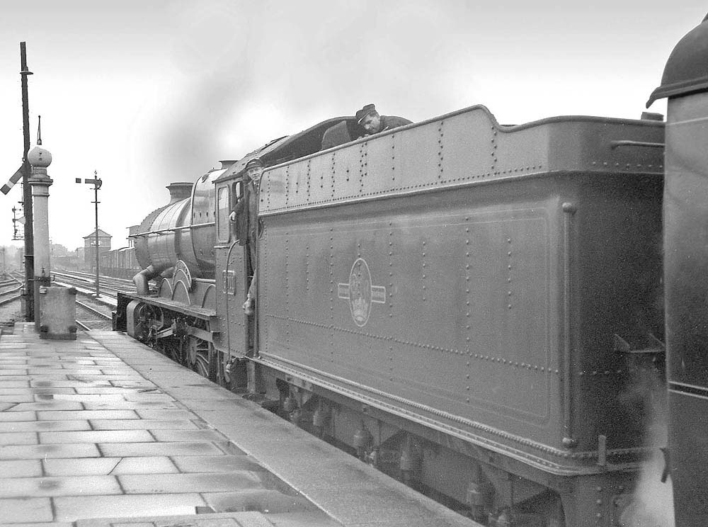 Ex-GWR 4-6-0 King Class No 6011 'King James I' stands at Leamington with the down Cambrian Coast Express on 20th April 1962