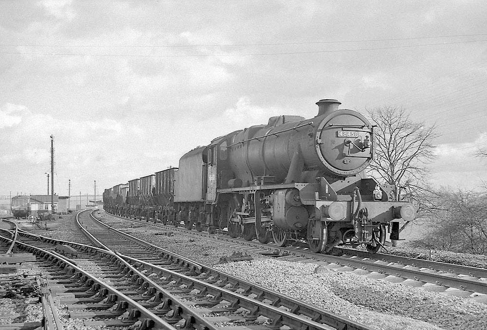Ex-LMS 2-8-0 8F No 48458 passes Leamington Spa shed with a mineral train bound for South Wales on 11th April 1965