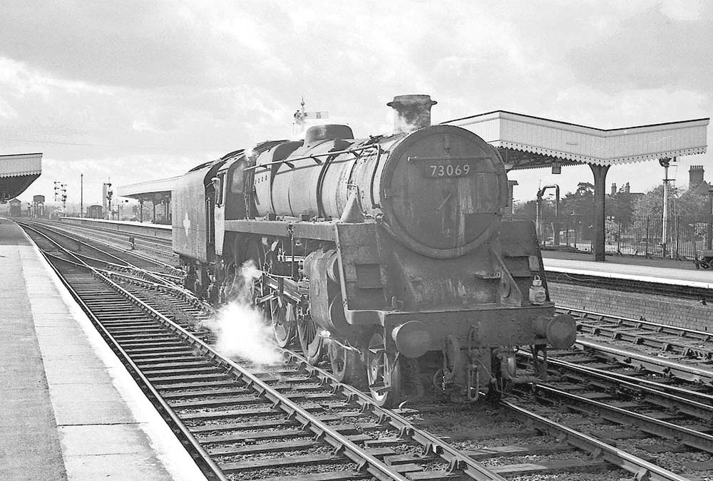 British Railways 4-6-0 Standard Class 5MT No 73069 runs northwards  light engine at Leamington on 11th April 1965