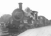 GWR 4-4-0 No 3830 'Armorel' stands at the up platform on a local passenger train to Banbury