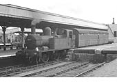 Ex-GWR 0-4-2T No 5813 stands in Leamington's down bay platform with a Gresley Full Brake on  31st August 1957
