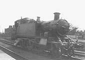 An unknown GWR 31xx 2-6-2T stands in one of the middle sidings  at Leamington station