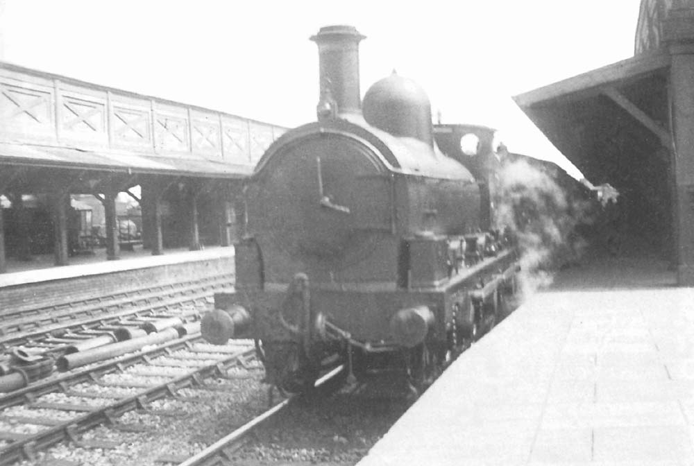 GWR Standard Goods 0-6-0 No 391 arrives from Wolverhampton with an up excursion passenger train