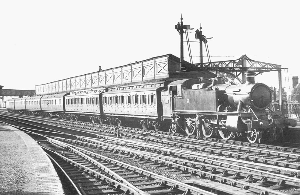 GWR 2-6-2T 'Large Prairie' No 5181 heads a two-coach clerestory and a four-coach 57 ft set at the up platform