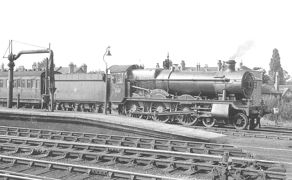 GWR 4-6-0 Hall class No 5959 'Mawley Hall' is seen with 'A' lamps on indicating its working a train of empty SR stock