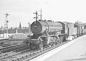 Ex-WD 2-8-0 Austerity No 90516 runs through the down through road at the head of a mixed goods train