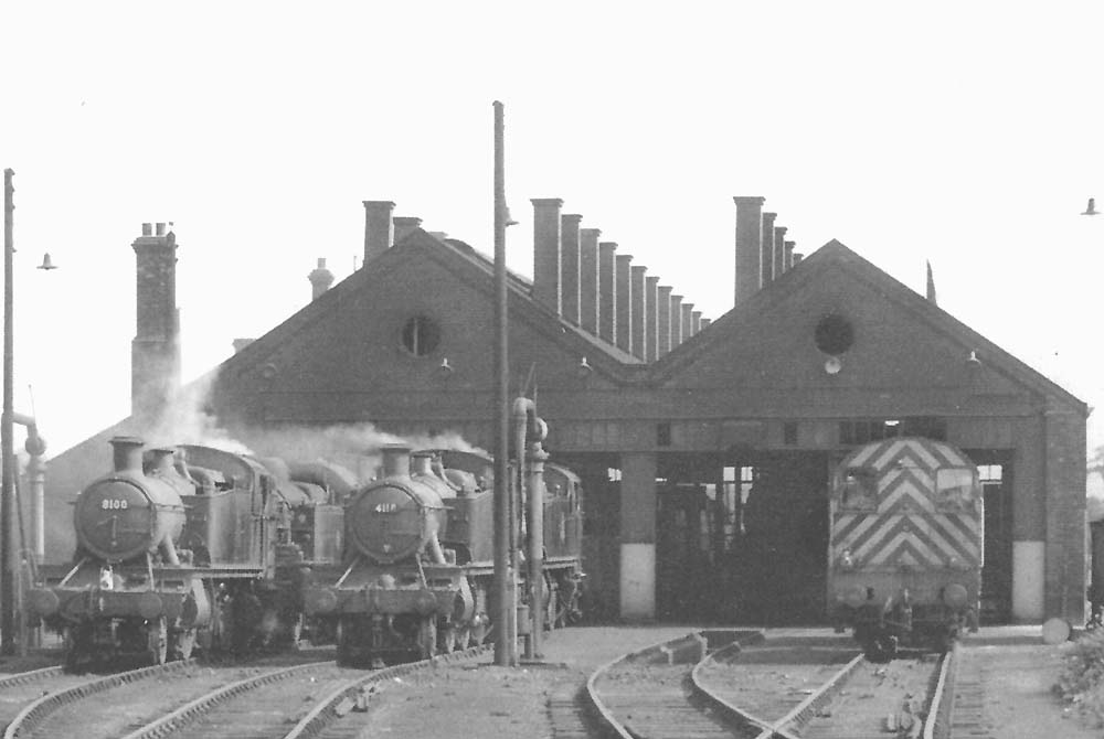 Close up showing ex-GWR 2-6-2T No 8100 and 2-6-2T No 4118 in steam outside Leamington shed