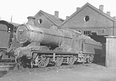 Ex-GWR 2251 Class 0-6-0 No 2291 is seen standing outside Leamington shed in bright sunlight