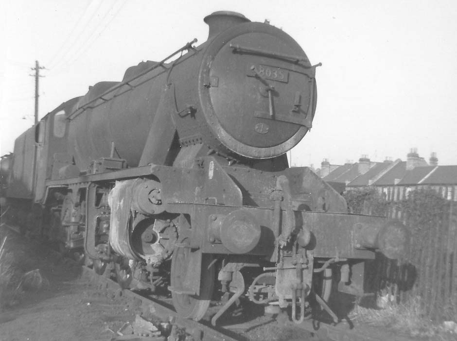 Ex-LMS 8F 2-8-0 No 48035 is seen with damaged cylinders at Leamington shed
