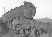 Ex-LMS 8F 2-8-0 No 48035 is seen out of commission with damaged cylinders at Leamington shed