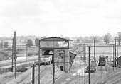 Close up of the coaling stage showing wagons stabled at the top of the ramp despite the track being overgrown