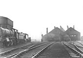 View of the shed showing a number of locomotives standing on storage road adjacent to the coaling stage