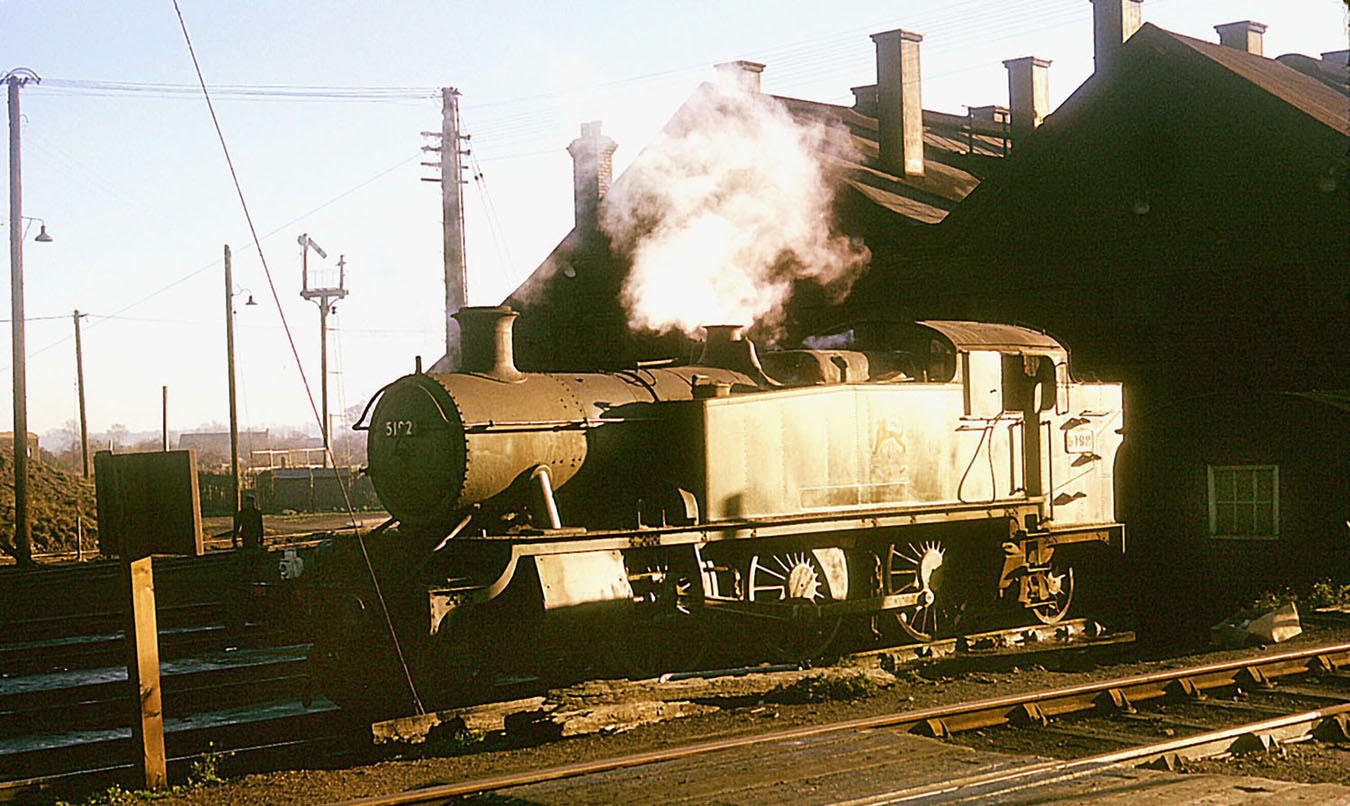 Ex-GWR 2-6-2T No 5192 standing in the late afternoon sun at the front of Leamington shed in December 1961
