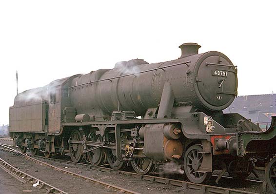 Ex-LMS 2-8-0 'Stanier' 8F No 48751 is seen standing in front of Leamington Shed in March 1962
