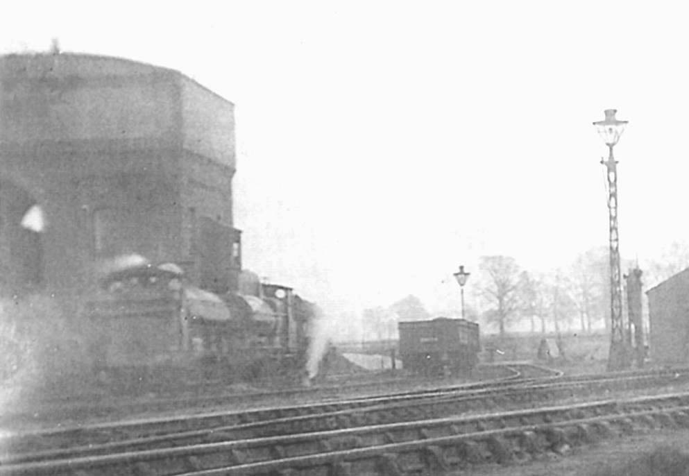 Close up of an unidentified GWR 0-6-0ST locomotive and an unidentified Dean 0-6-0 Class 2301 locomotive