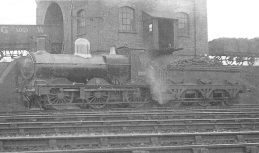 Ex-GWR 2301 Class 0-6-0 No 2328 is seen standing beneath the coaling stage in September 1911