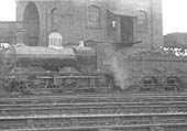 Ex-GWR 2301 Class 0-6-0 No 2328 is seen standing beneath the coaling stage in September 1911