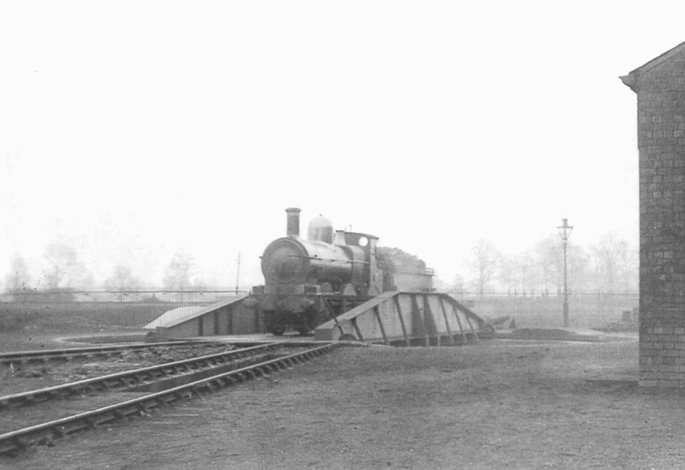 An unidentified GWR 2301 Class 0-6-0 locomotive is seen being turned on Leamington shed's turntable circa 1908