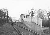 Looking towards the goods yard with the branch to Moreton-in-Marsh curving to the left beyond the level crossing gates