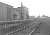 View looking in the direction of Shipston-on-Stour showing the station name board 'Longdon Road for Ilmington' and the corrugated hut used to store parcels