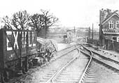 Close up of the line to Moreton in Marsh on the right and loading gauge protecting the line by the level crossing