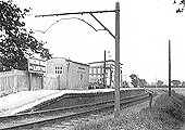 Looking east towards Shipston-on-Stour with the corrugated parcel shed standing next to the station name board