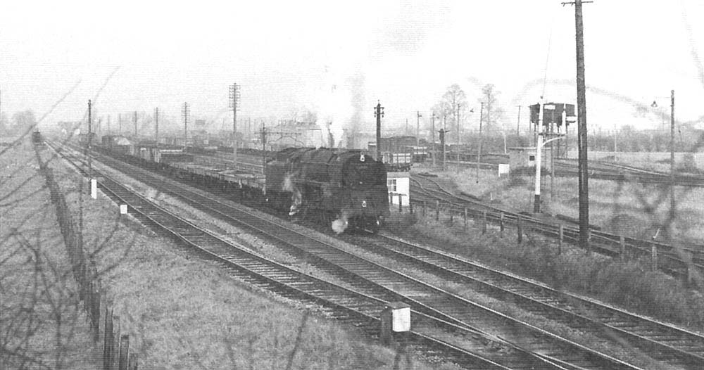 An earlier view showing the connection of the MOD depot with the down main line and, on the left, the relief loop line