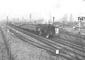 An earlier view showing the connection between the MOD depot with the down main line and, on the left, the relief loop line