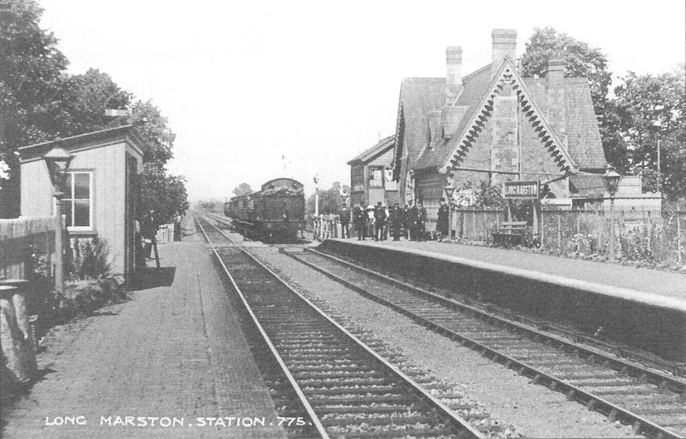 Another early view of Long Marston station as a Stratford to Honeybourne local passenger train enters the station