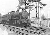 Ex-GWR 2-6-0 43xx Class No 6362 is seen at the head of a down freight service to Honeybourne