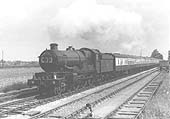 Ex-GWR 4-6-0 No 5046 'Earl Cawdor' heads the Down 'Cornishman' past Milcote station's sidings on 31st May 1961