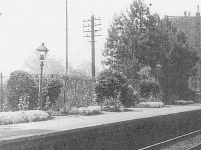 Close up showing the down platform and the extensive flowerbeds and flora created and maintained by the station staff